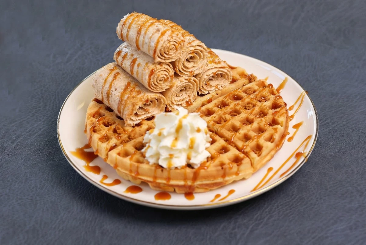 Rolled ice cream served on a golden waffle